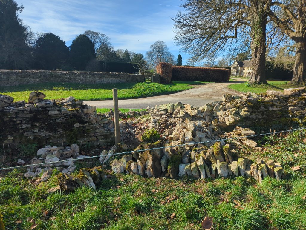 Rebuild and repair of a field wall in Tetbury, Cotswolds, Gloucestershire