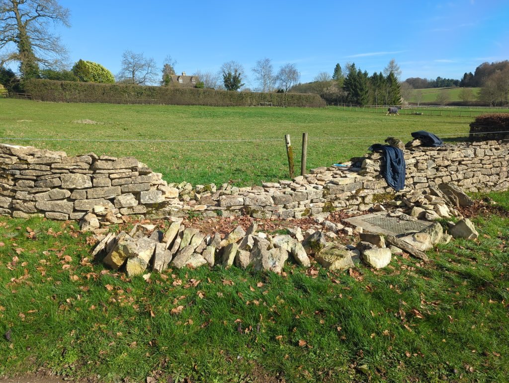 Rebuild and repair of a field wall in Tetbury, Cotswolds, Gloucestershire