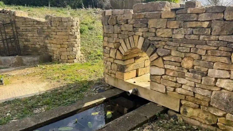 dry stone arch gatepost water feature bisley stroud gloucestershire 4